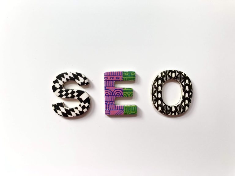 SEO letters with colorful patterned designs, marketing and SEO tips.