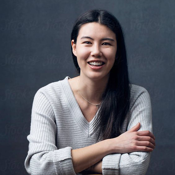 Tomiko Fine, author and contributor to Shoot for the Edit, smiling portrait.