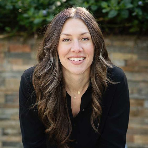 a woman smiling for the camera