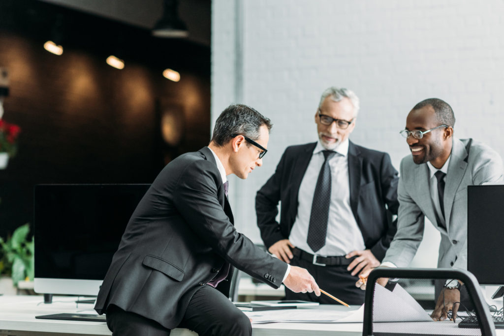 businessmen discussing new business strategy on meeting in office