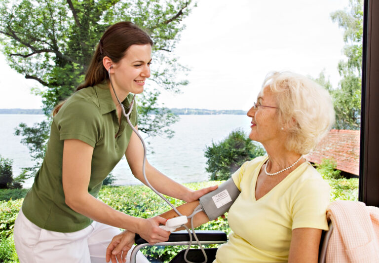 nurse taking woman s blood pressure 2022 03 04 01 53 14 utc scaled