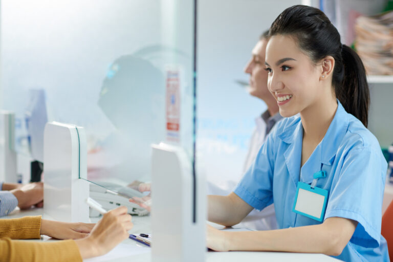 nurse working at hospital reception 2022 02 11 18 15 53 utc